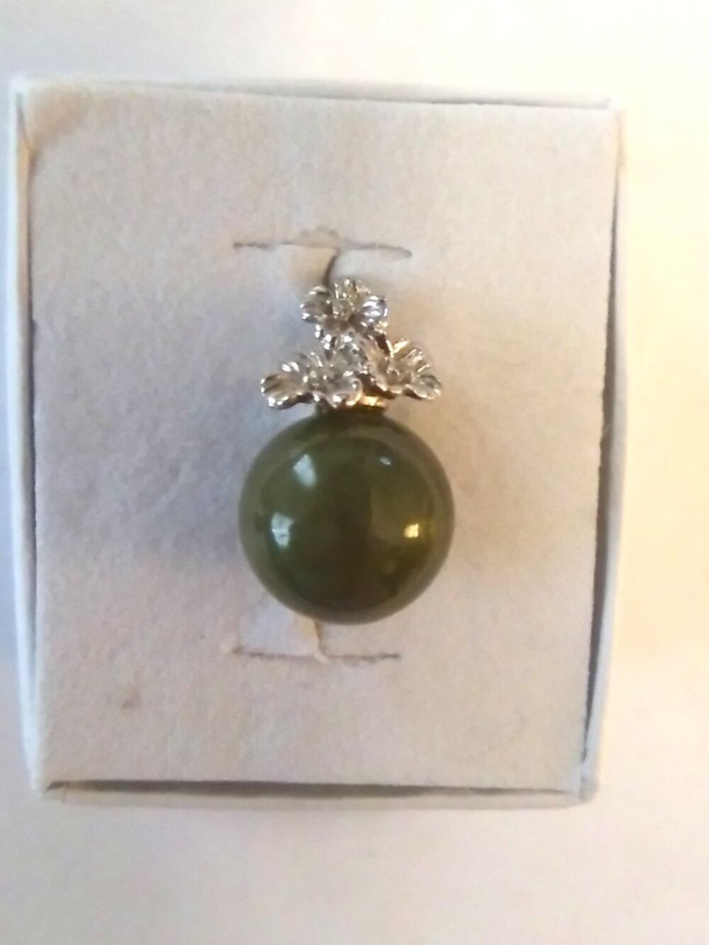 Green Jade (jadeite?) Pendant with Floral Silver Detail